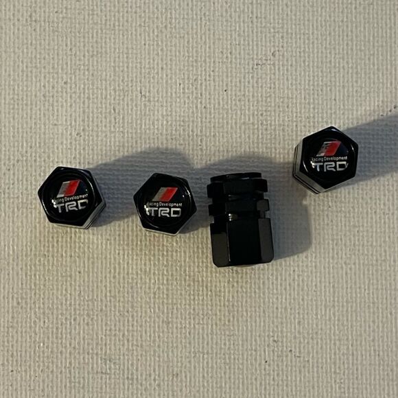 Toyota TRD valve Stem caps in Black set of 4 NWT - Picture 1 of 4